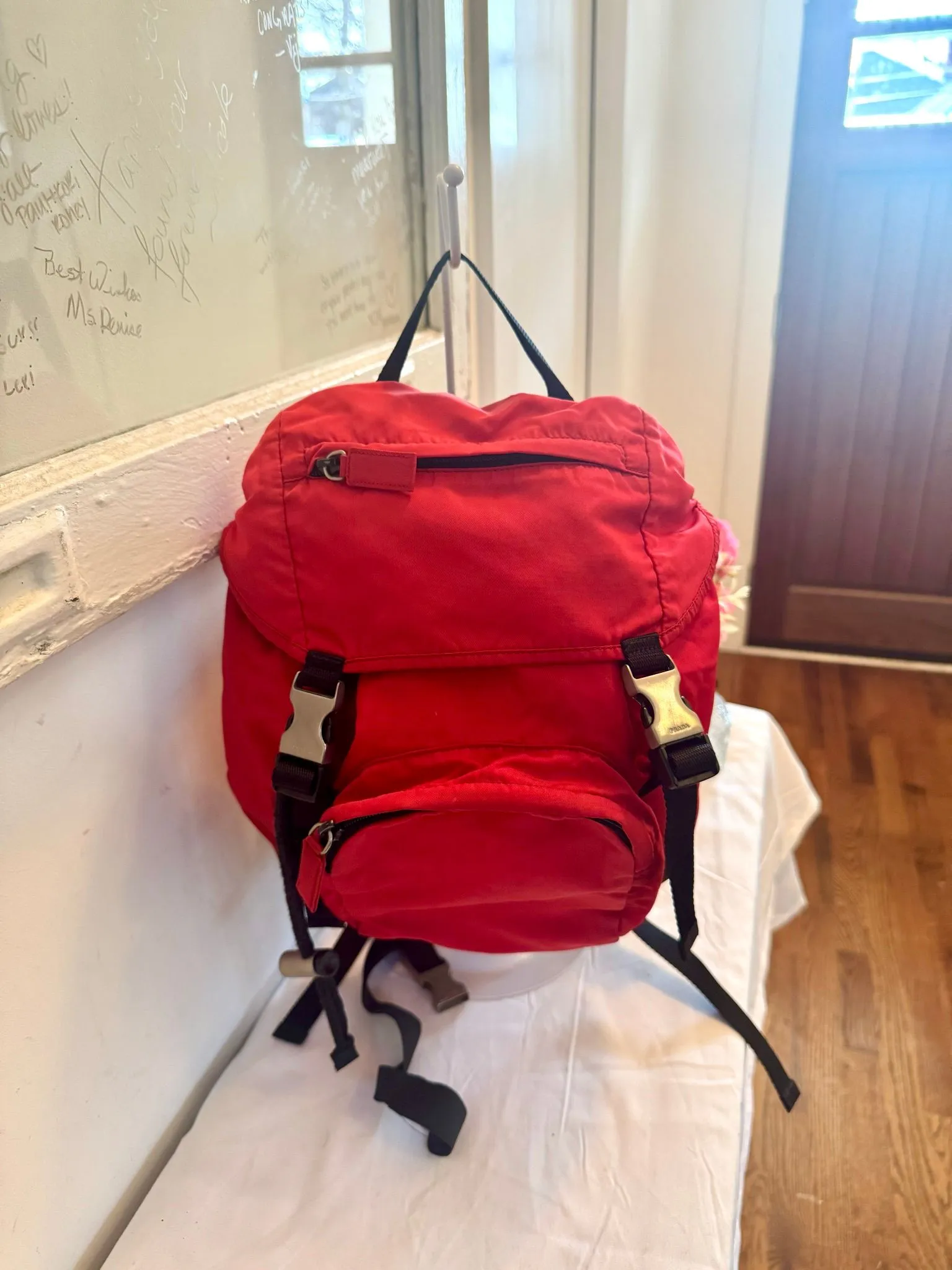 Authenticated Red Prada Nylon Backpack — pre-owned luxury designer bag | LaceLuxx