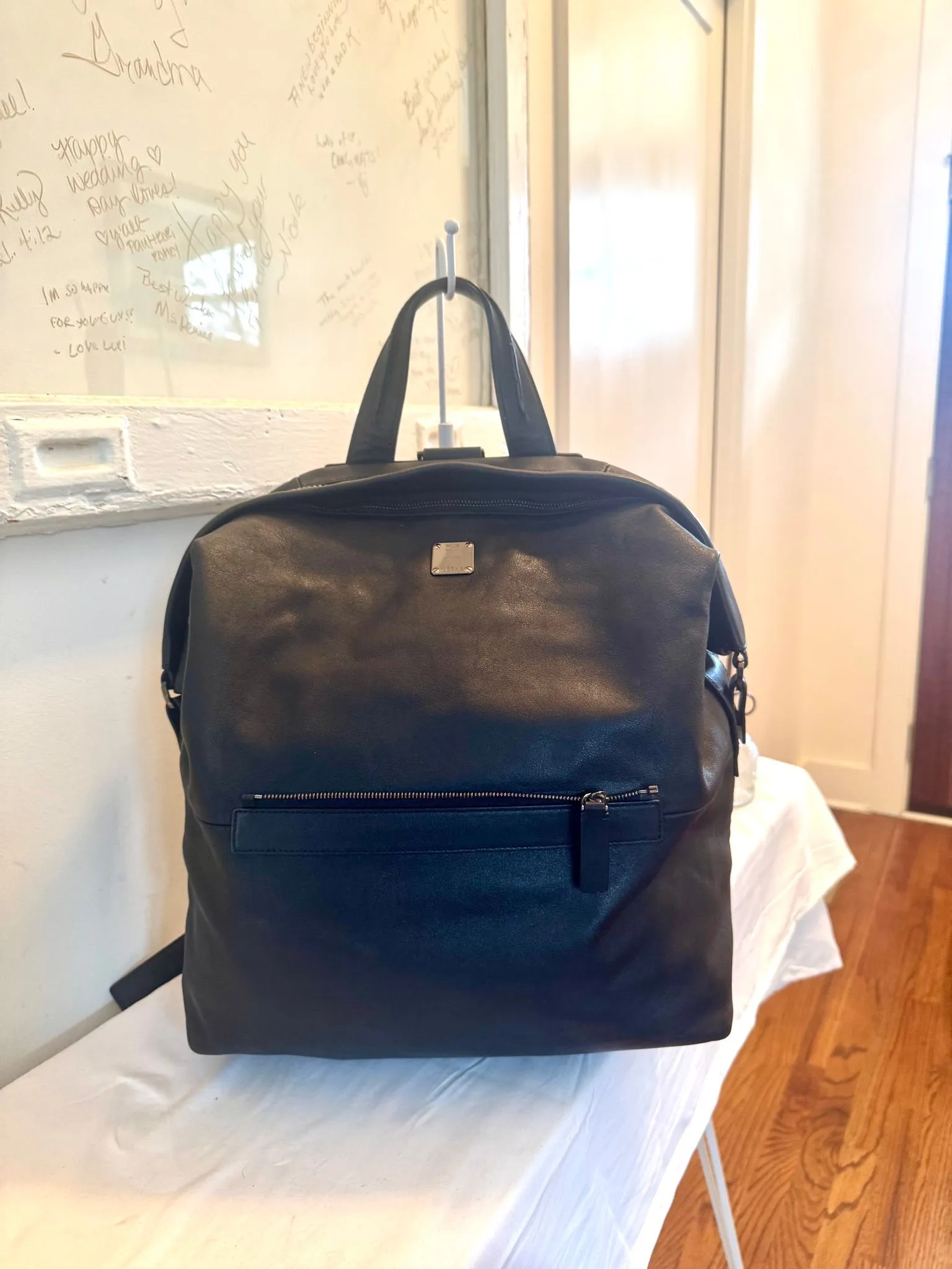 Authenticated Black MCM Leather Backpack - Missing Pouch — pre-owned luxury designer bag | LaceLuxx