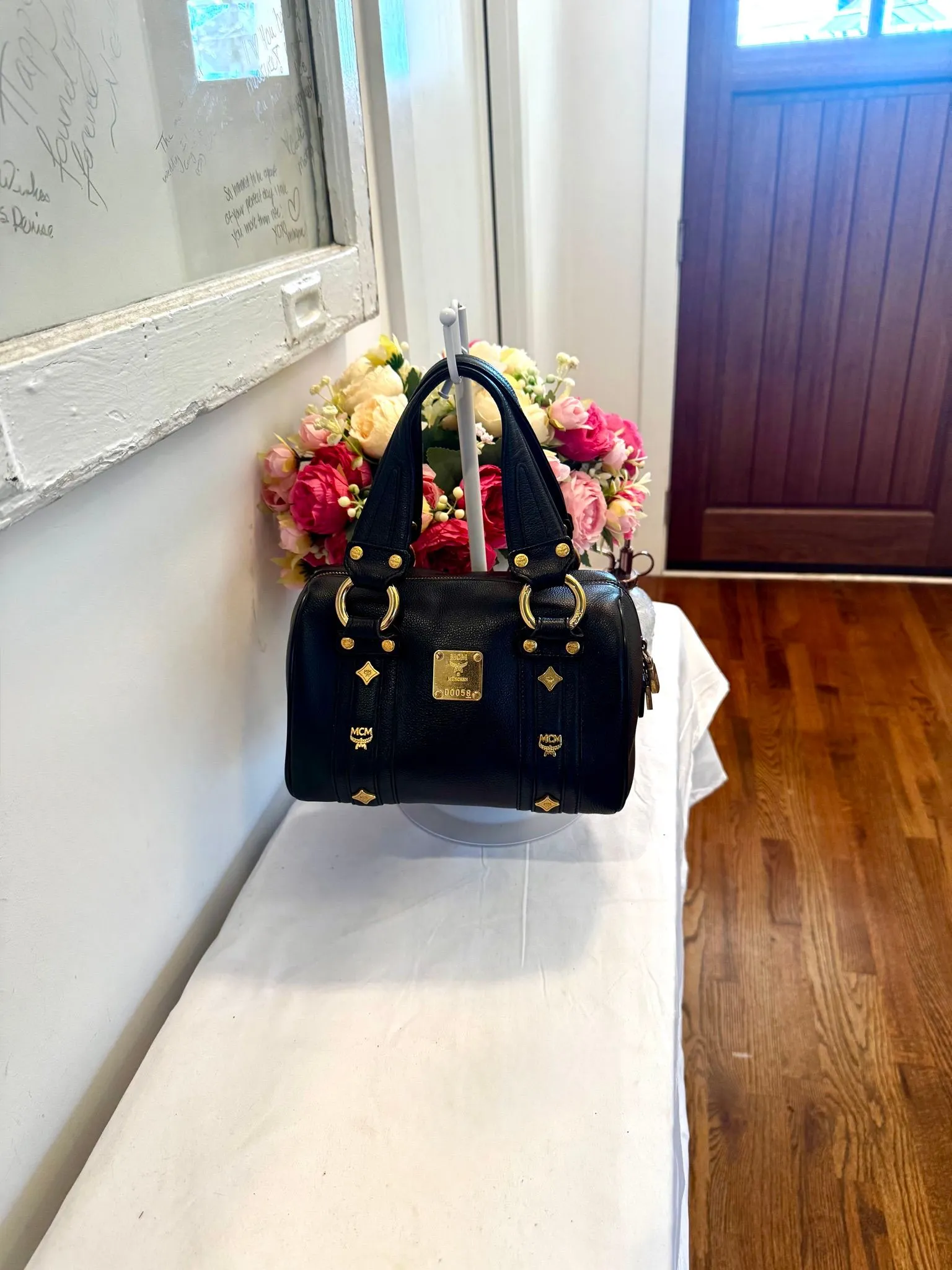 Authenticated Black MCM Boston Bag — pre-owned luxury designer bag | LaceLuxx
