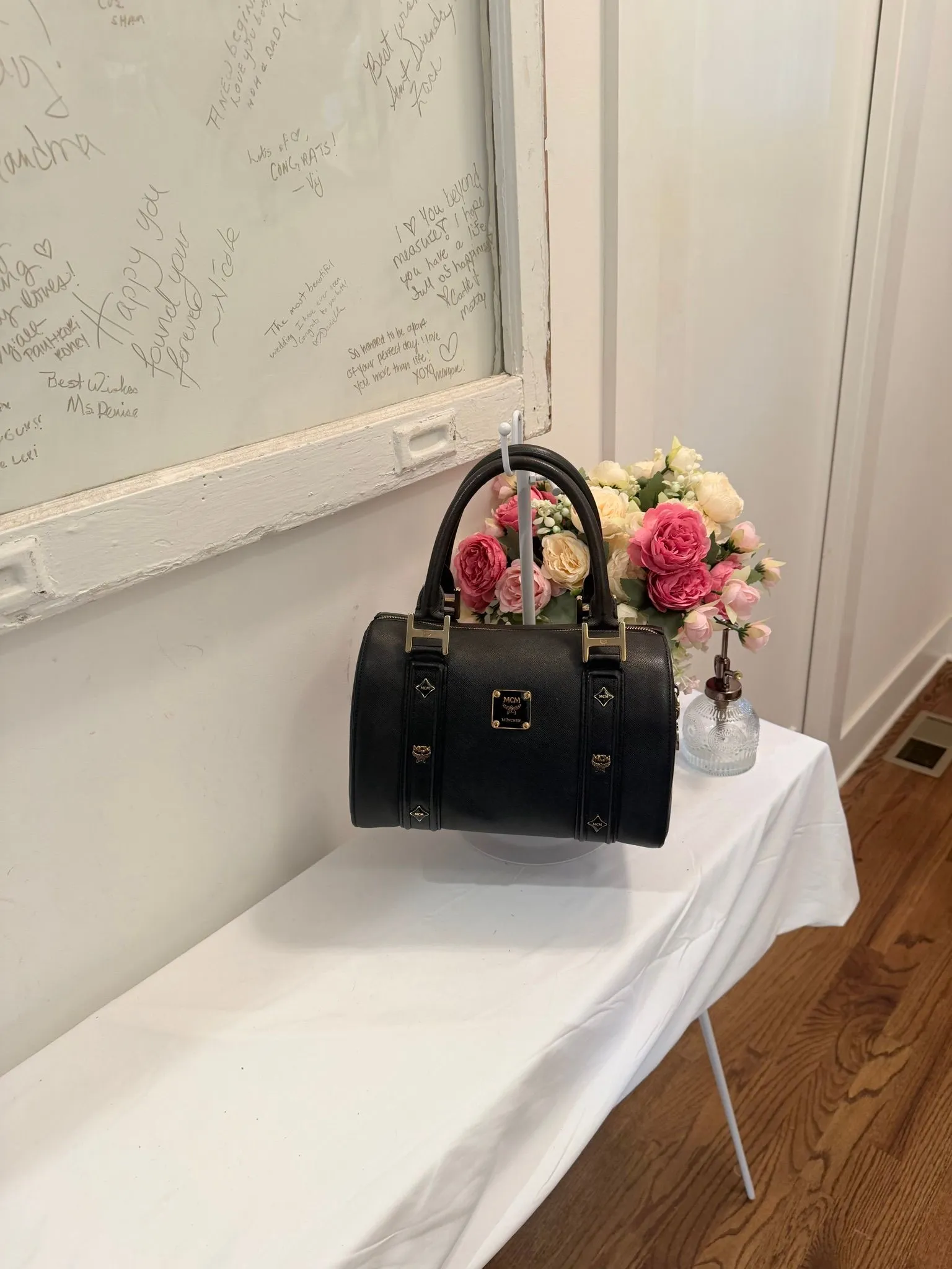 Authenticated Black MCM Boston with Black Enamel Plate and Gold Hardware — pre-owned luxury designer bag | LaceLuxx