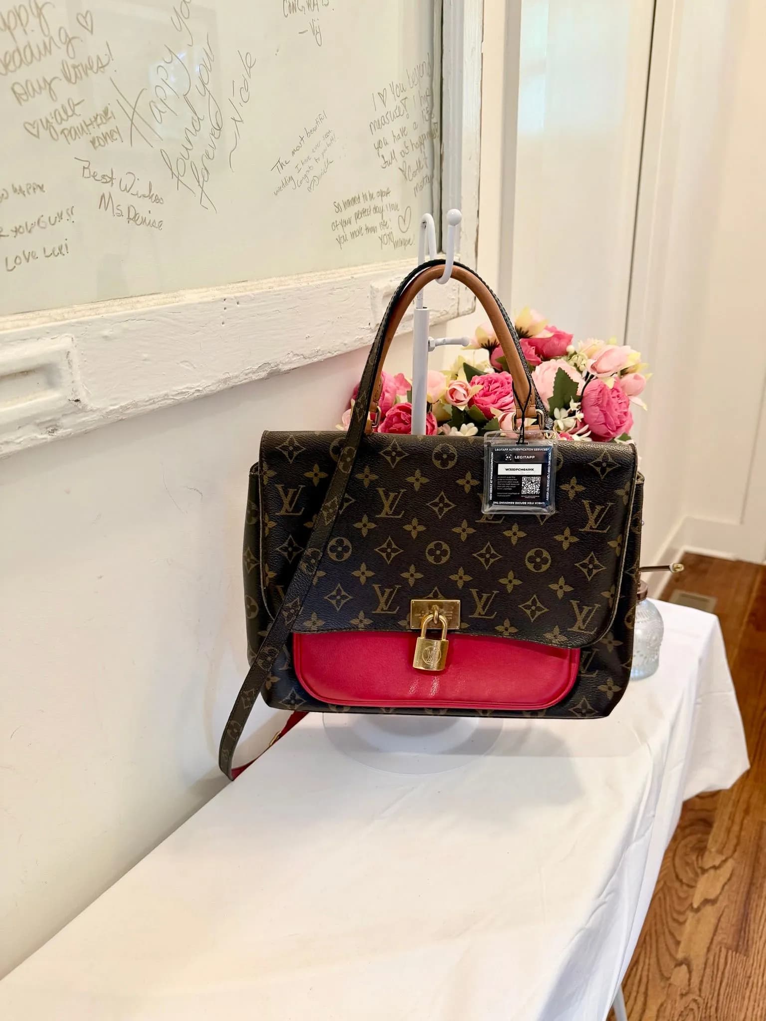 Authenticated Louis Vuitton Marignan Monogram 2Way Bag with Red Detail — pre-owned luxury designer bag | LaceLuxx