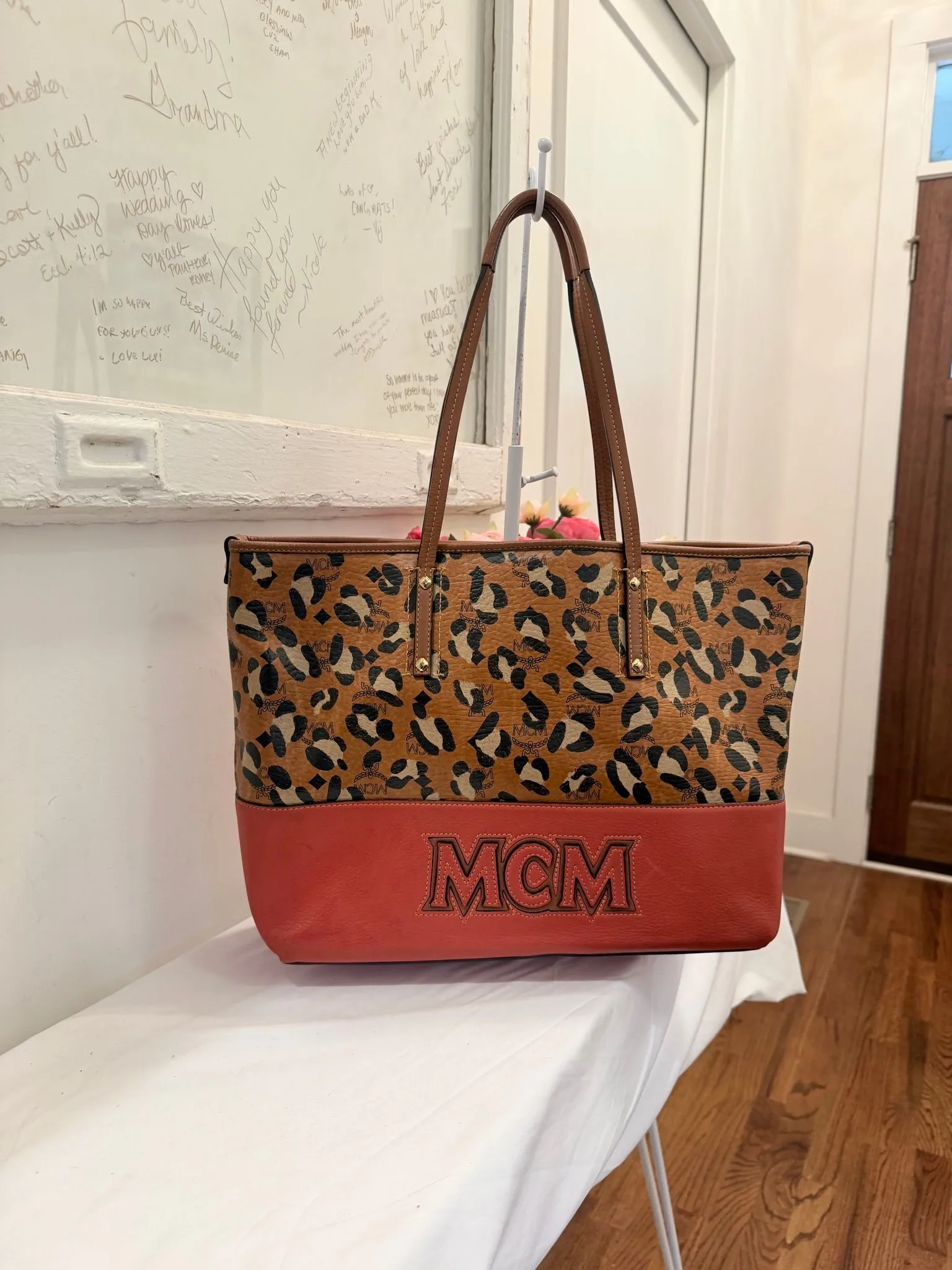 Authenticated Cheetah and Red MCM Tote — pre-owned luxury designer bag | LaceLuxx