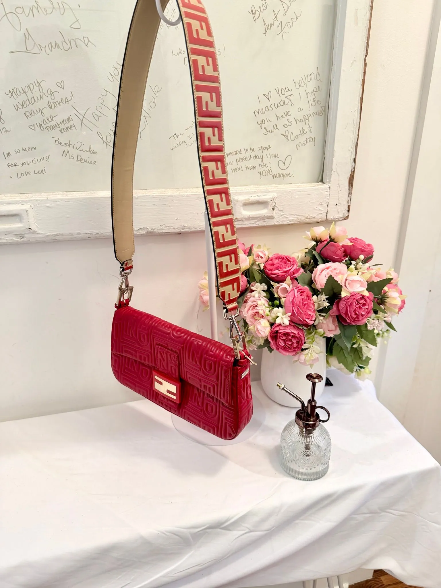 Authenticated Red Fendi Leather Embossed Baguette with Red and Cream Fendi Guitar Strap — pre-owned luxury designer bag | LaceLuxx