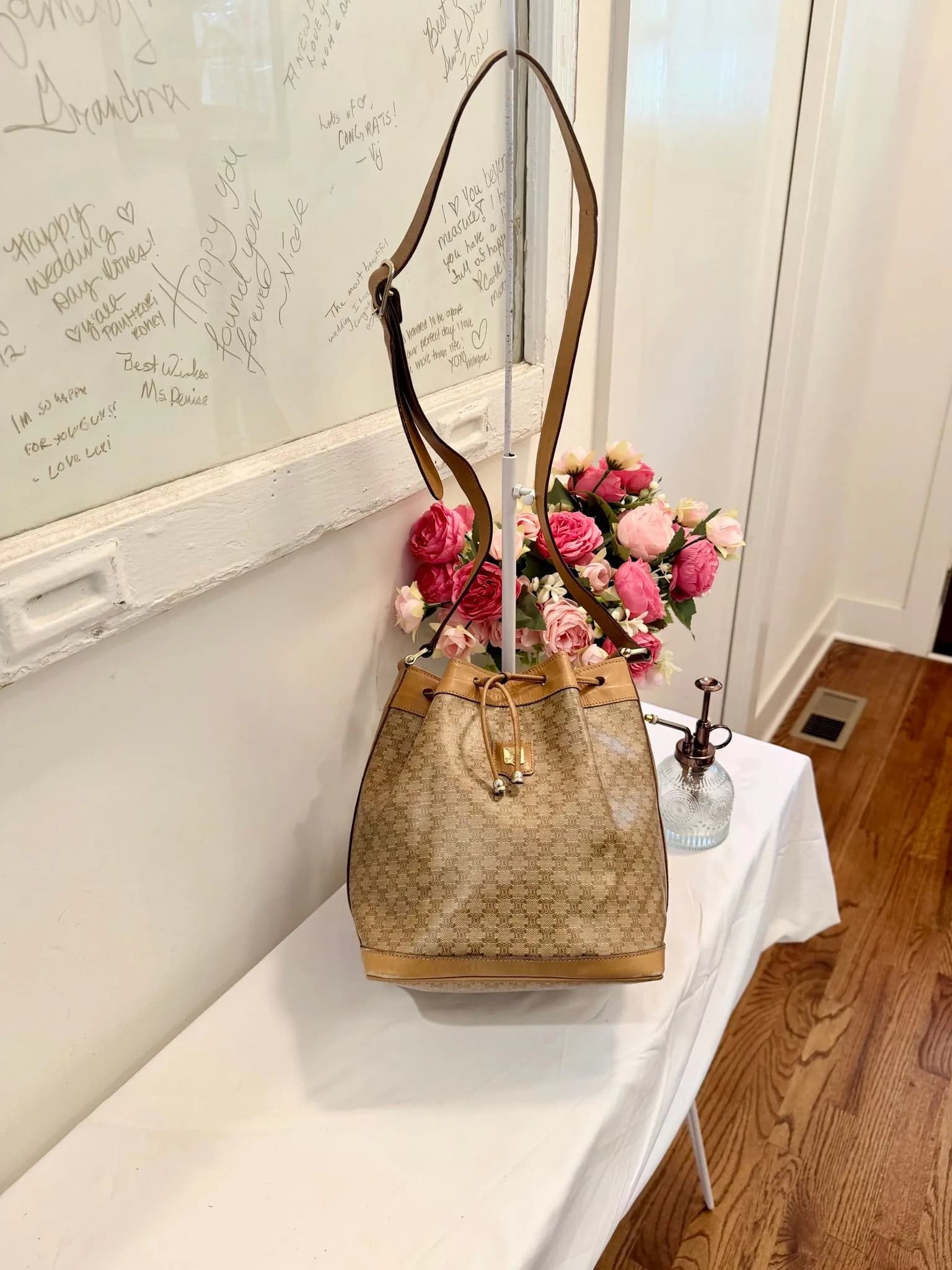 Authenticated Celine Tan Monogram Drawstring Bucket Crossbody — pre-owned luxury designer bag | LaceLuxx