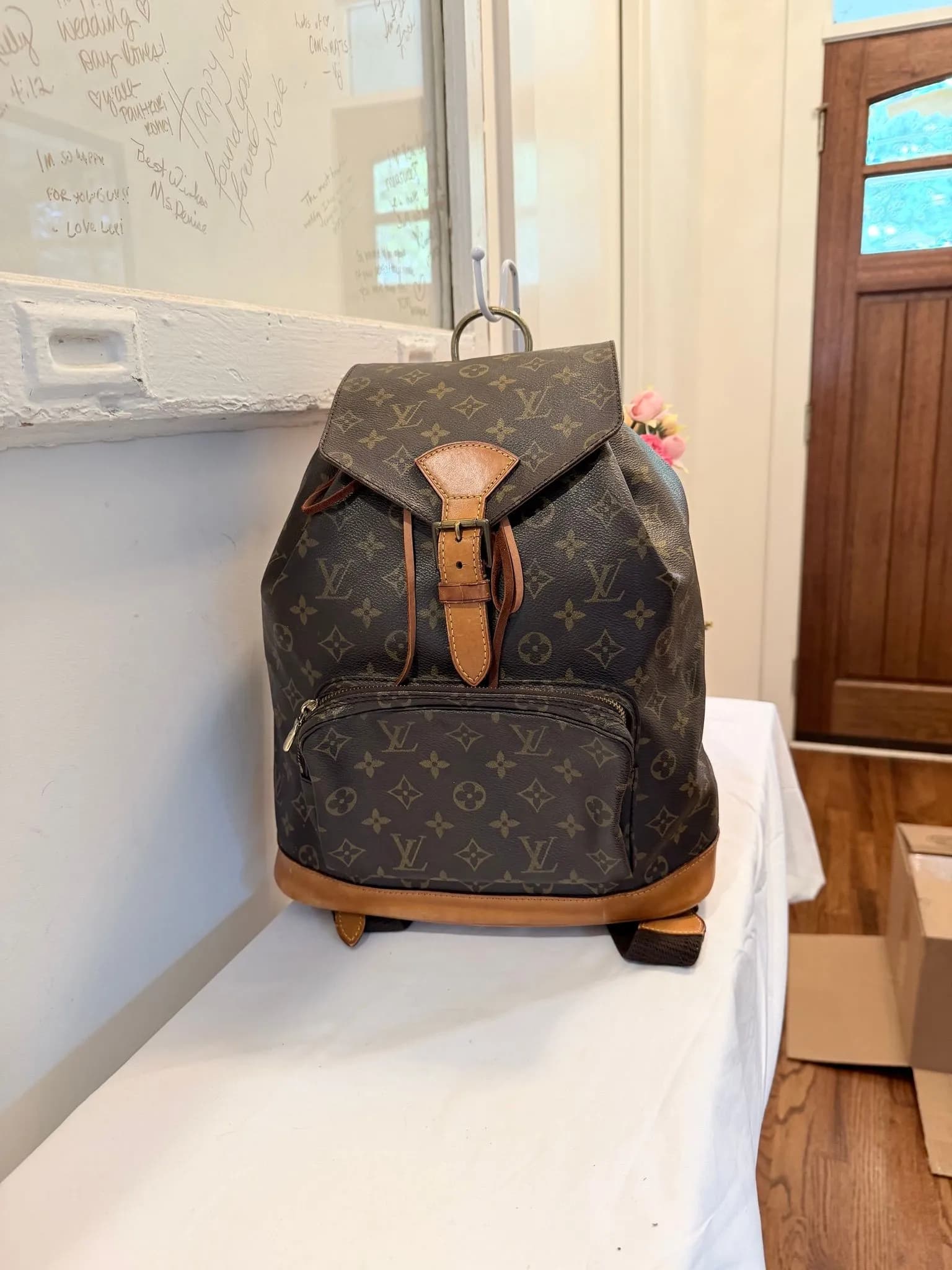 Authenticated Louis Vuitton Monogram GM Backpack — pre-owned luxury designer bag | LaceLuxx