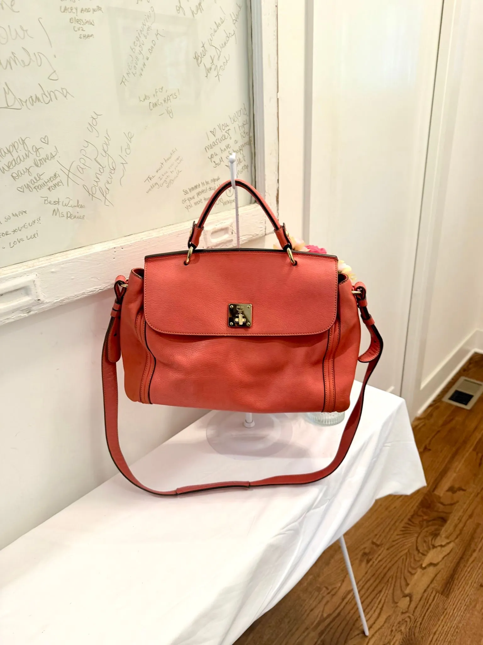 Authenticated Coral Two Way MCM with Top Handle — pre-owned luxury designer bag | LaceLuxx