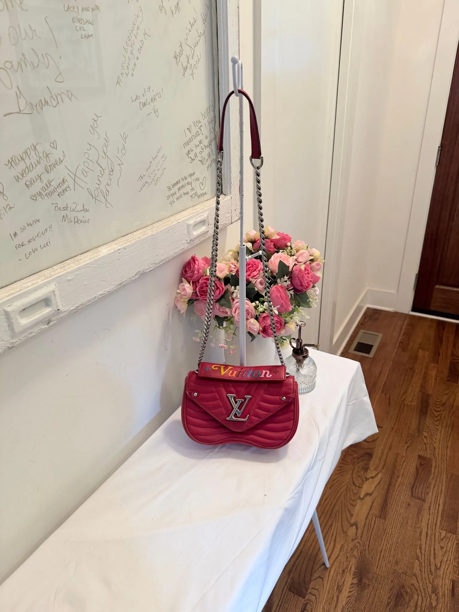 Authenticated Red Louis Vuitton Wave — pre-owned luxury designer bag | LaceLuxx