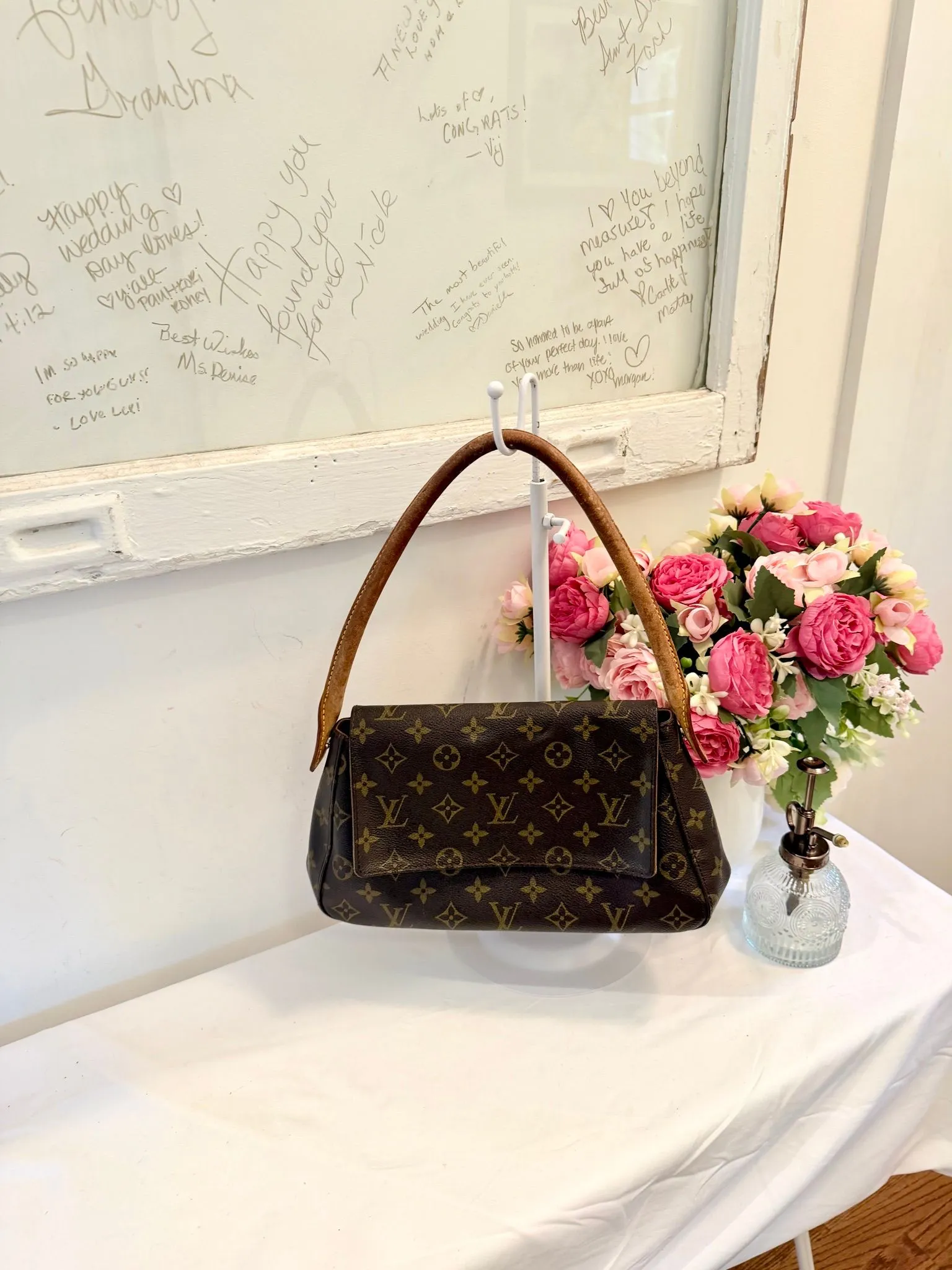 Authenticated Louis Vuitton Monogram Mini Looping — pre-owned luxury designer bag | LaceLuxx