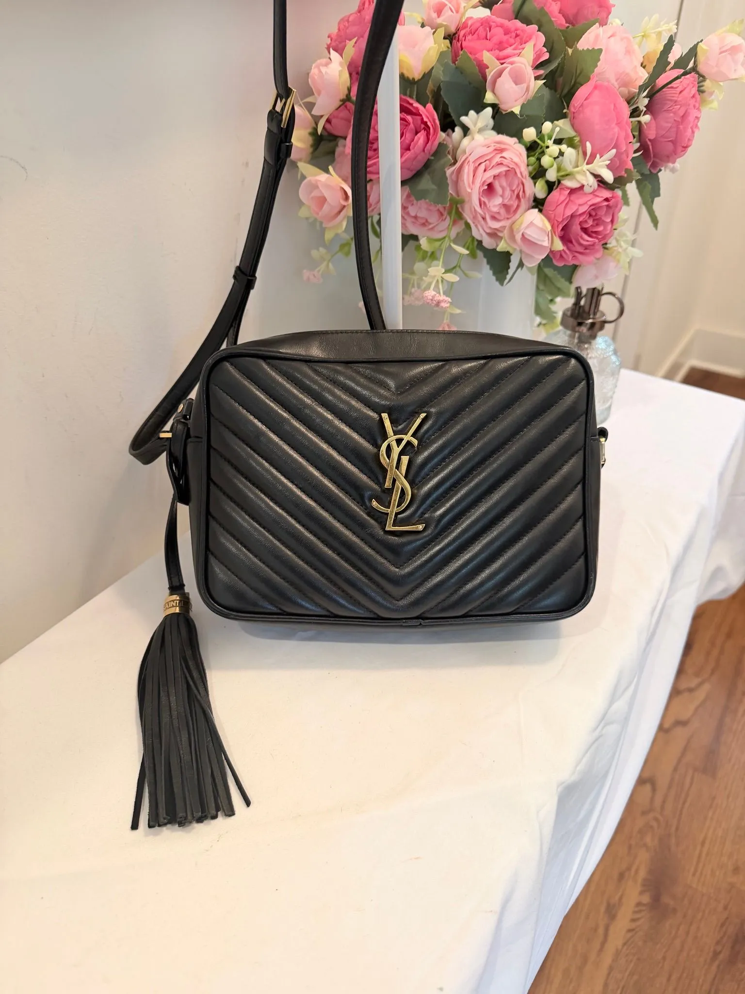 Authenticated Black YSL Saint Laurent Lou Camera Bag Crossbody with Tassel — pre-owned luxury designer Saint Laurent bag | LaceLuxx