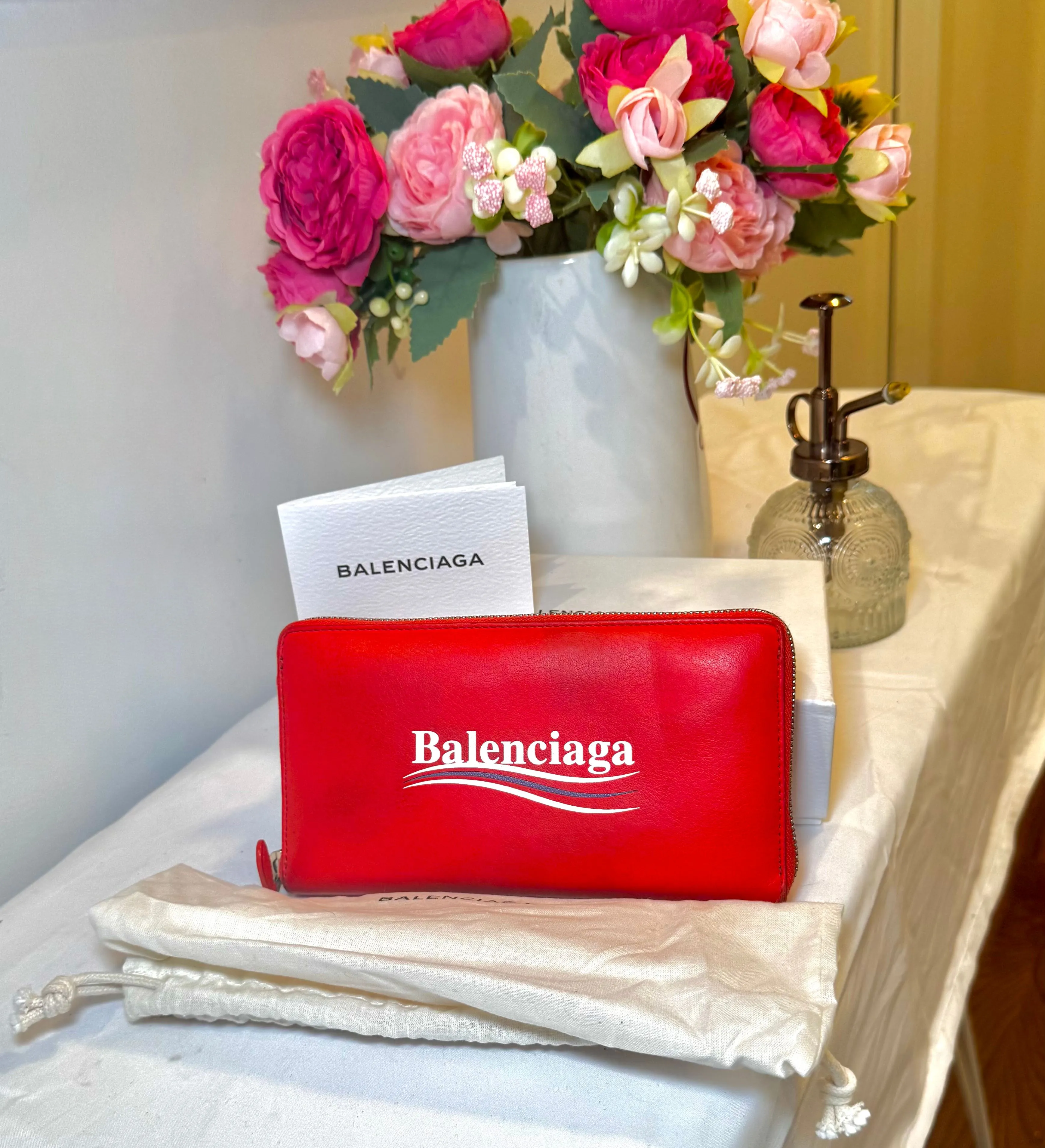 Authenticated Balenciaga Red Zippy Wallet — pre-owned luxury designer bag | LaceLuxx